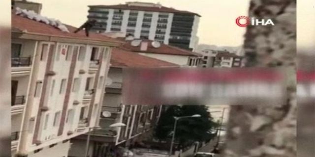 Ankara'da binanın çatısındaki adamdan tehlikeli hareket